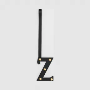 博百利/Burberry Z 字母铆钉皮革吊饰 (黑色 / 浅金色) - 女士  80235431