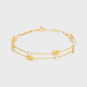 思琳/Celine TRIOMPHE PEARL金色饰面黄铜和树脂珍珠双圈手链 460PL6PRB.01GI