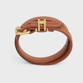 思琳/Celine LES CUIRS牛皮革和金色饰面黄铜双圈手链 460SF3BCF.04GT