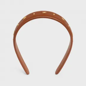 思琳/Celine TRIOMPHE牛皮革和金色饰面黄铜发箍 460WF3BCF.03TG