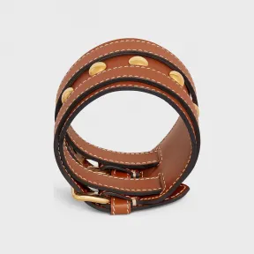 思琳/Celine 女士 Celine 金色饰面黄铜和小牛皮经典皮革铆钉手链 - 金色 / 棕褐色 46Y423BCF.04GT