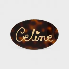 思琳/Celine CELINE金色饰面黄铜、深玳瑁色醋酸酯和铁合金手写体CELINE字样心形发夹 46Z196SBA.19AG