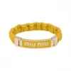 缪缪/Miu Miu 日光黄 徽标装饰软羊革和金属手环 5IB425-2F32-F0377