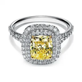 蒂芙尼/Tiffany Tiffany Soleste 系列铂金镶嵌枕形切割黄钻边镶珠链式钻石订婚钻戒。